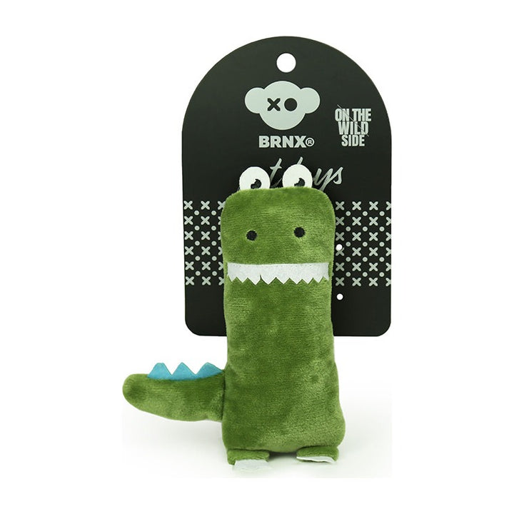 BRNX Maxi Toy juguete de peluche para gatos con forma de un dinosaurio verde con púas celestes, en su tarjeta de la marca