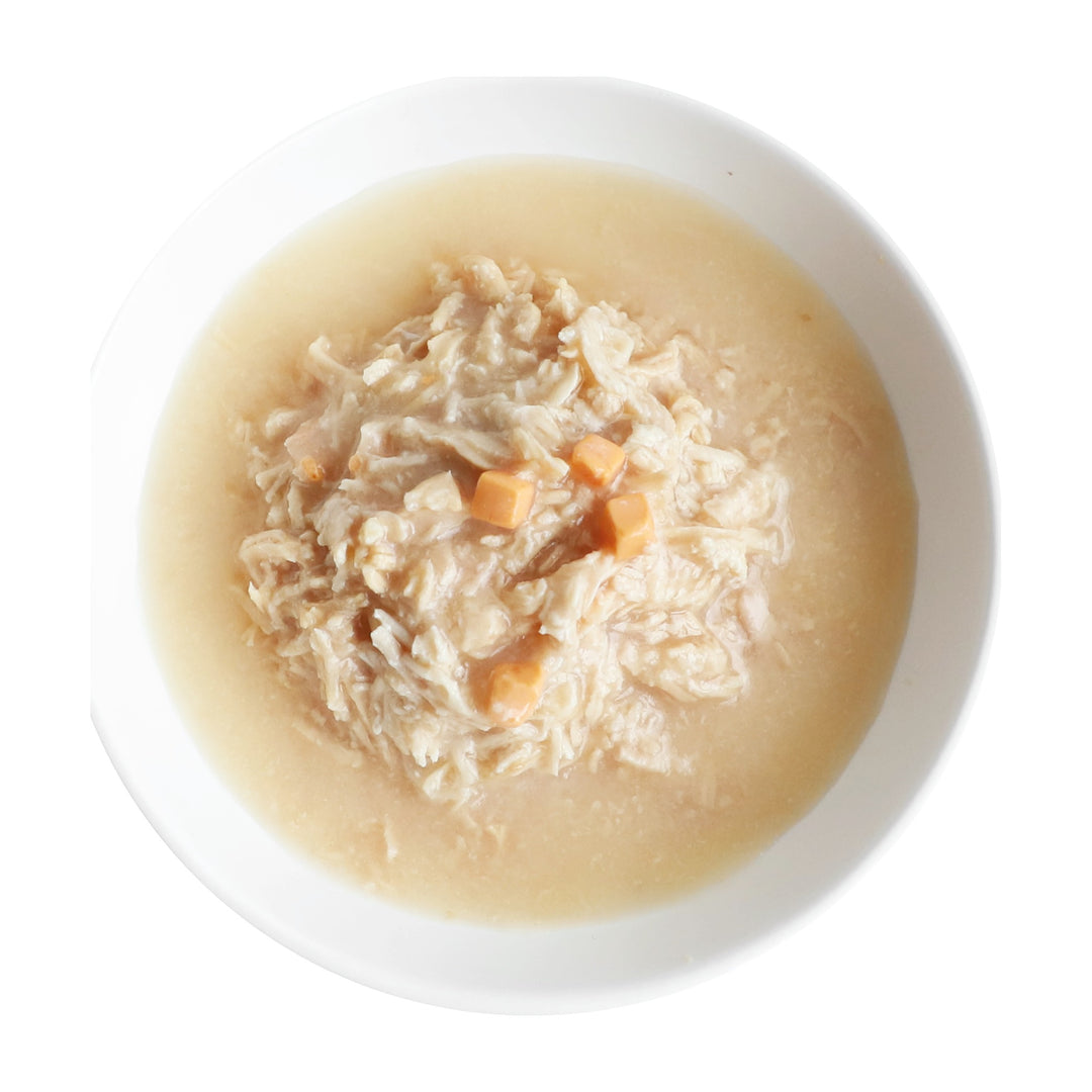 Kit Cat Goat Milk Gourmet pollo y queso servido en plato