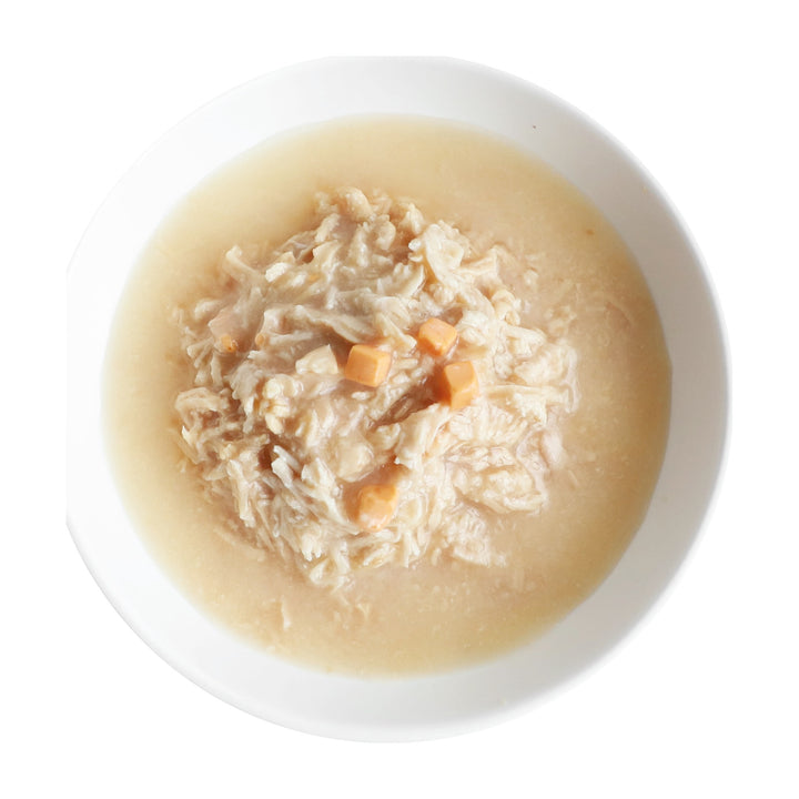 Kit Cat Goat Milk Gourmet pollo y queso servido en plato