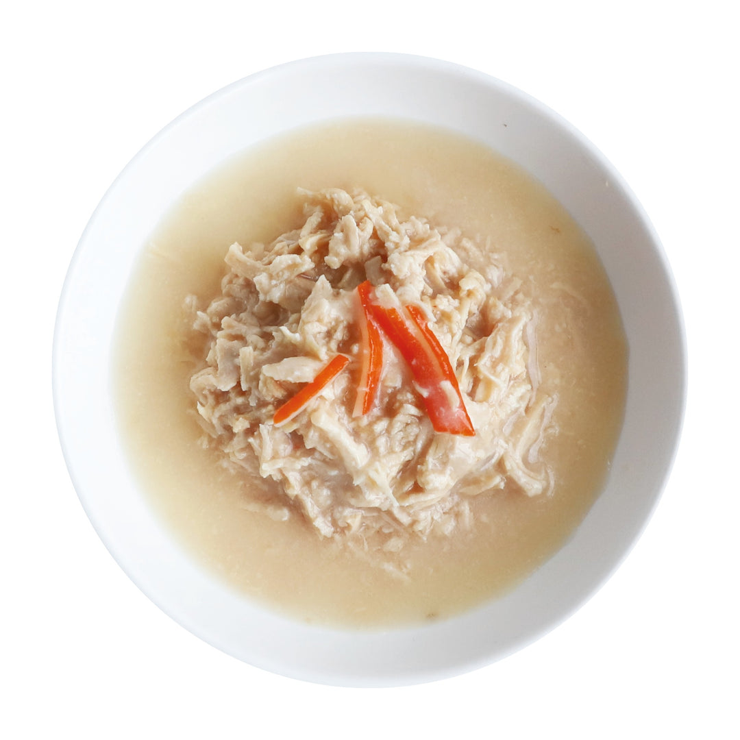 Kit Cat Goat Milk Gourmet pollo y cangrejo servido en plato